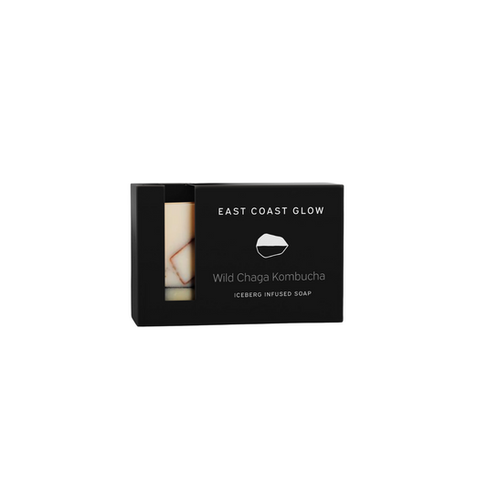 Bar of East Coast Glow Wild Chaga Kombucha Iceberg Infused Soap with natural clay and activated charcoal, highlighting its creamy texture and wildcrafted ingredients.