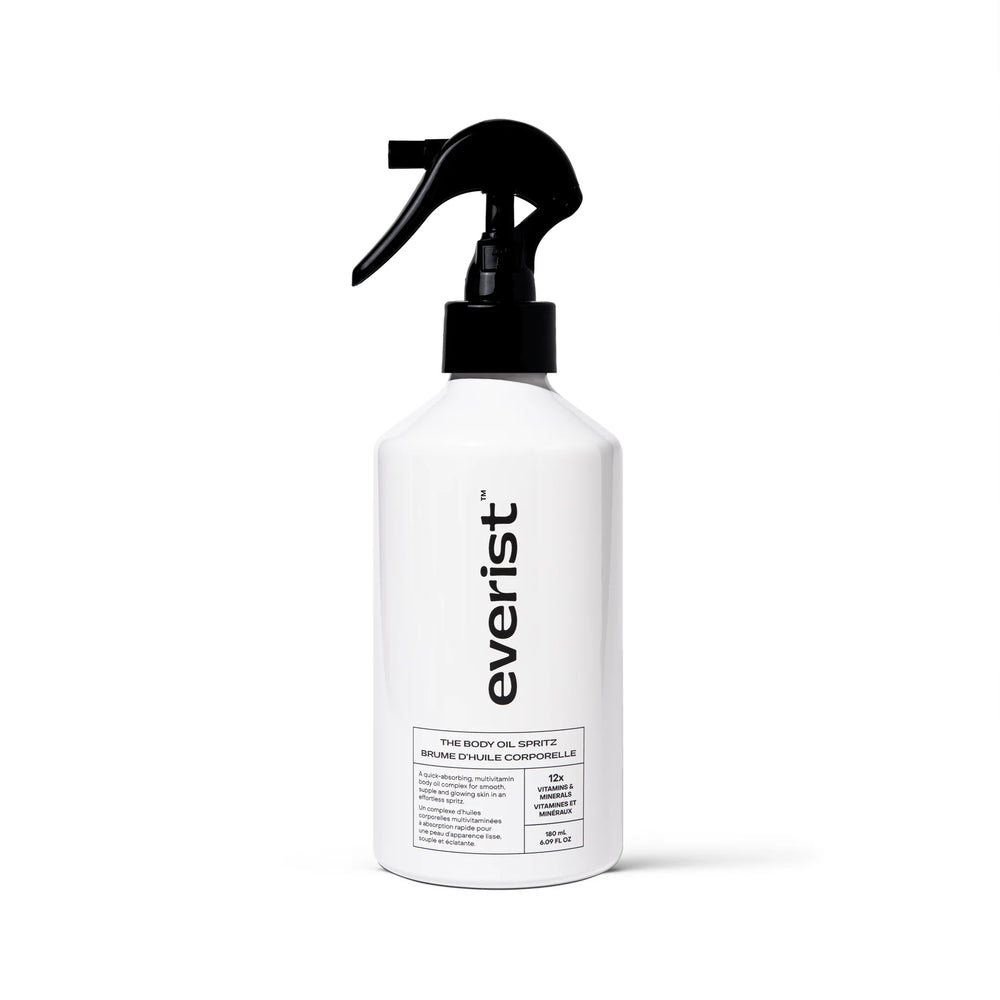 EVERIST The Body Oil Spritz in white aluminium bottle with black pump on white background