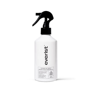 EVERIST The Body Oil Spritz in white aluminium bottle with black pump on white background