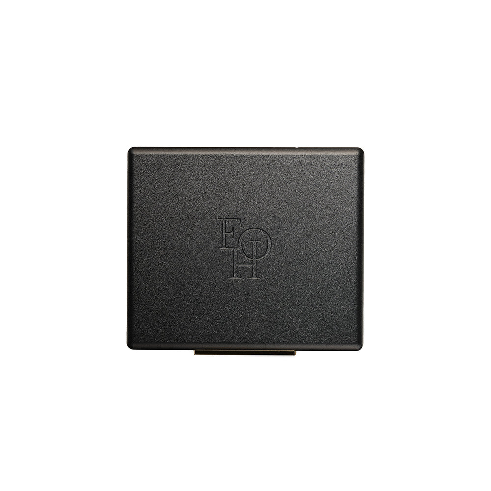 Eye of Horus Eyeshadow Compact Dawn with four bronze-toned shades in matte, satin, and shimmer finishes, enriched with natural botanicals and housed in a refillable eco-friendly compact.