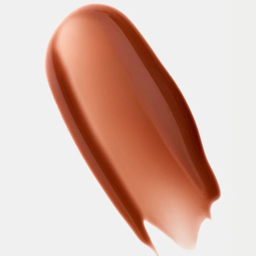 FACILE Clove Lip Jelly Tint in a sleek tube, showcasing a warm brown shade, designed to hydrate and enhance lips.
