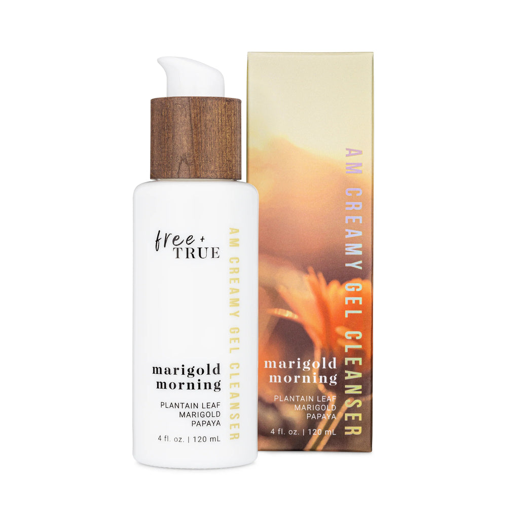 FREE + TRUE Marigold Morning AM Creamy Gel Cleanser in white glass bottle with white and bamboo pump on white background