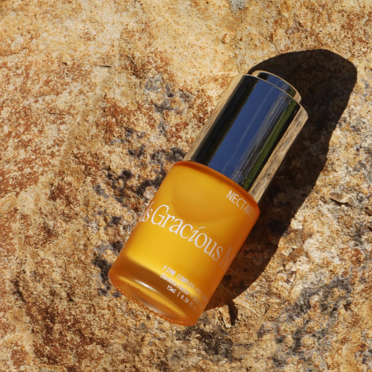 Nectar Complex Firming Eye Serum by GRACIOUS MINDS, featuring a lightweight formula with banksia flower nectar and plant stem cells for revitalizing the under-eye area.