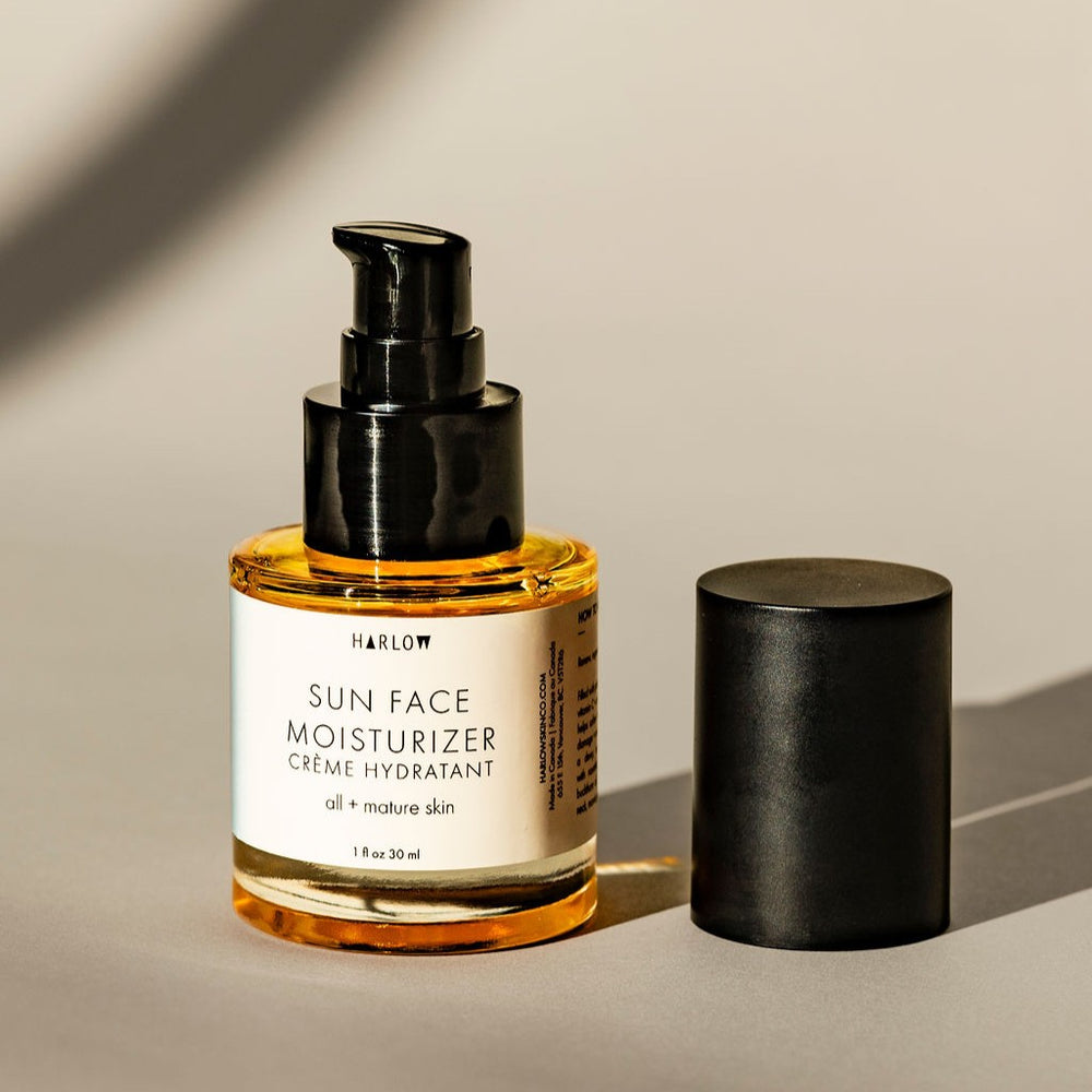 Harlow Sun Face Moisturizer in a glass bottle with seabuckthorn and evening primrose oils.