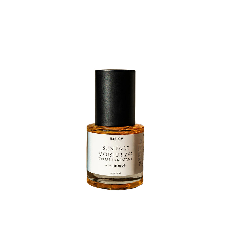 Harlow Sun Face Moisturizer in a glass bottle with seabuckthorn and evening primrose oils.