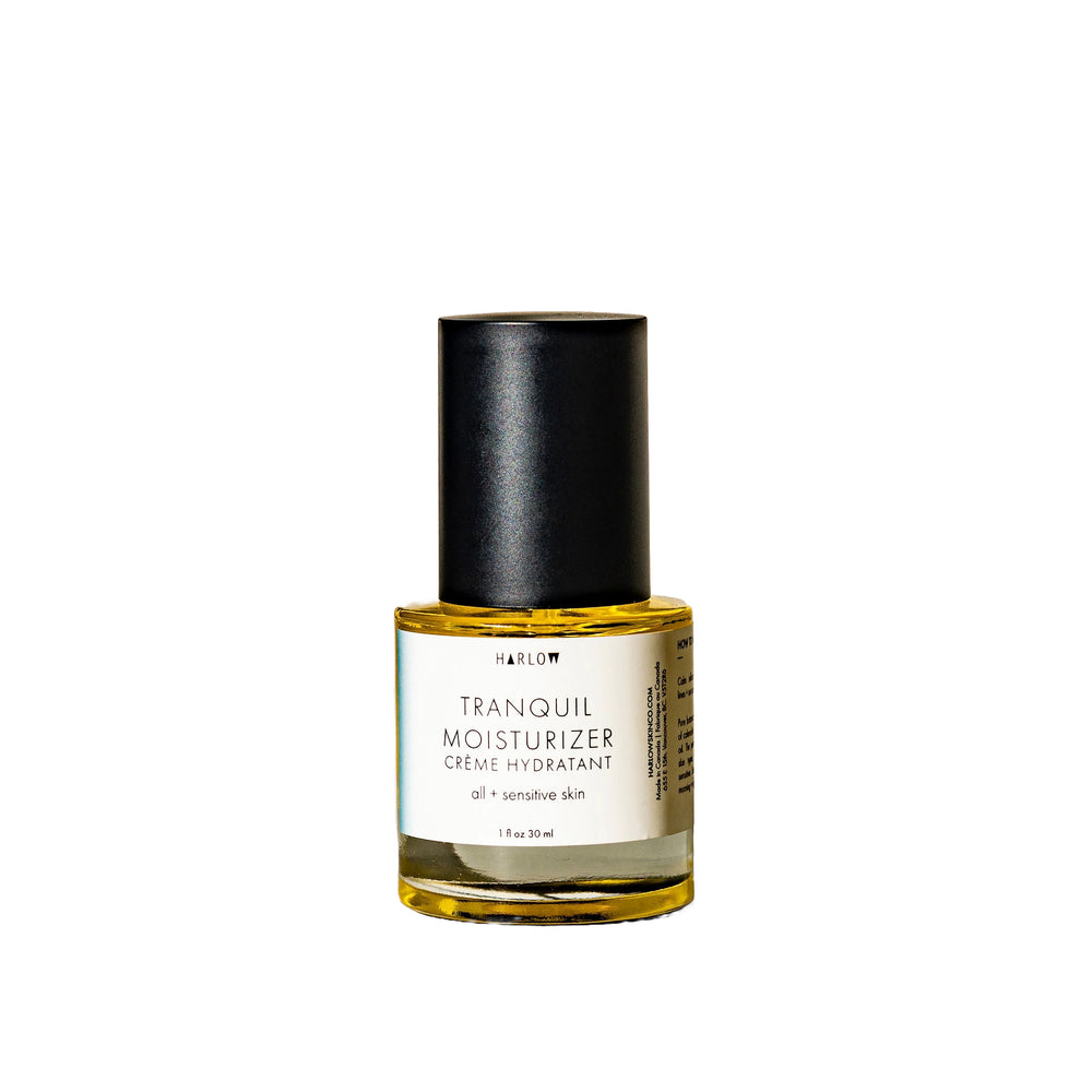 Harlow Tranquil Moisturizer face oil with calendula and borage in a refillable glass or aluminum bottle.