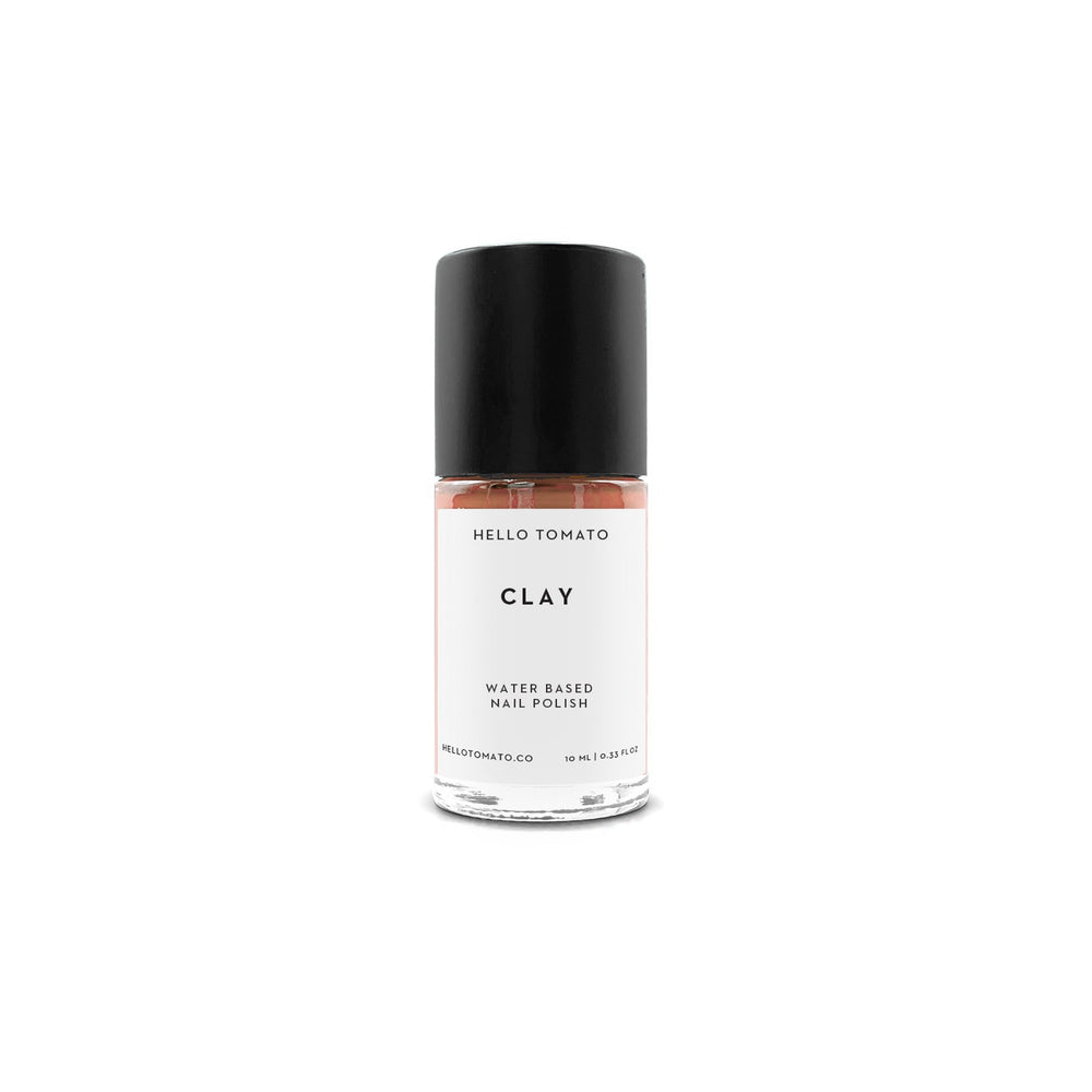 HELLO TOMATO Clay nail polish, an earthy terracotta color reminiscent of the humble but versatile clay.