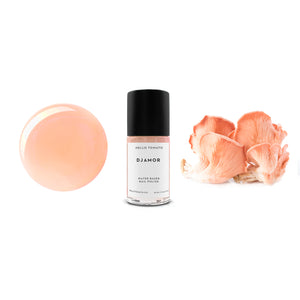Bottle of HELLO TOMATO Djamor nail polish in a sheer salmon pink shade, vegan and water-based.