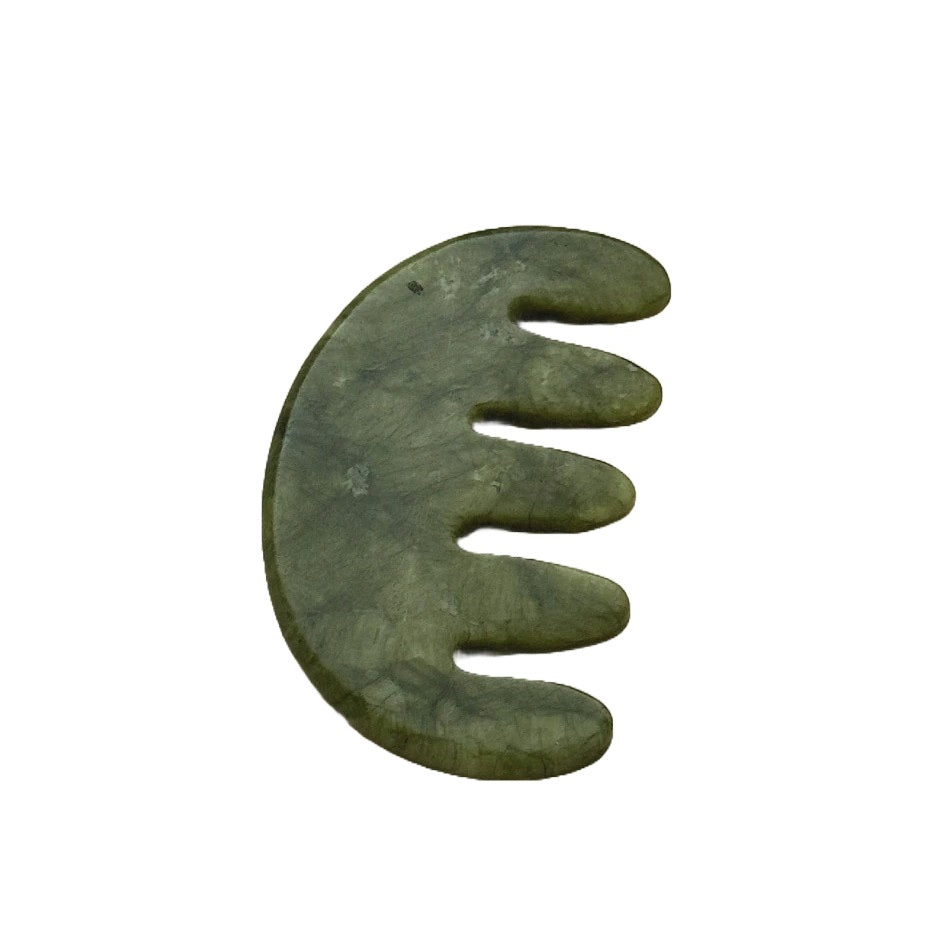 A hand-carved jade scalp stimulator made from natural Xiuyan jade, shown on a white background—designed to massage acupressure points on the scalp and enhance overall hair wellness.