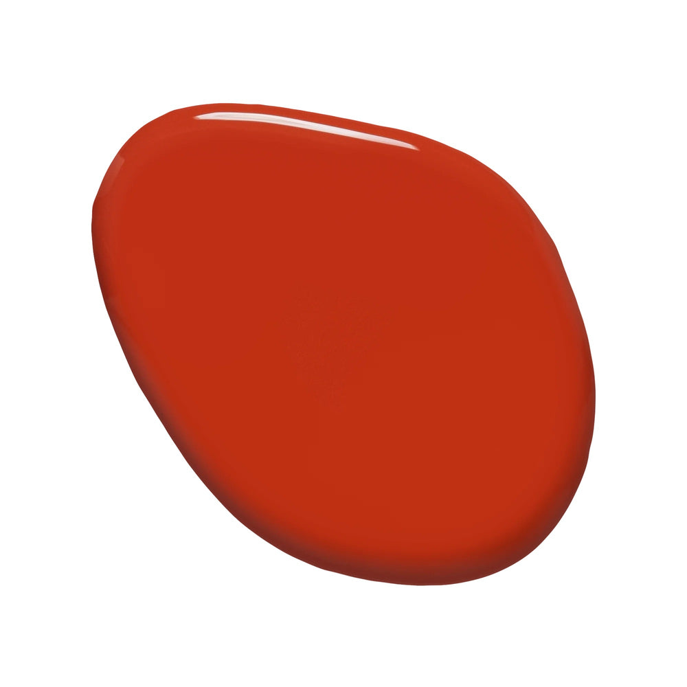 Huella Desert Dream nail lacquer in a warm desert orange shade, featuring a 15-free, vegan, and chip-resistant formula.