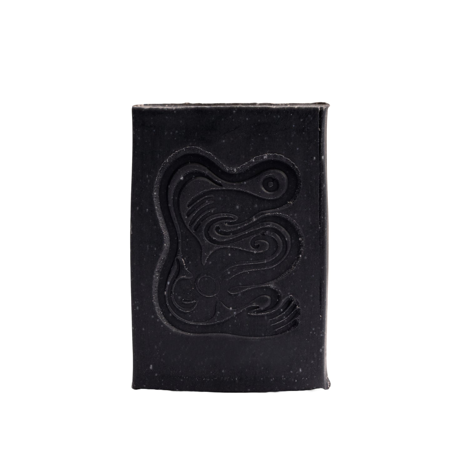 Black soap bar with a logo on a white background. INBLUEM Soul Soap Charcoal & Lemon Myrtle