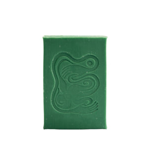 Green bar of soap with an embossed design on a white background. INBLUEM Soul Soap Finger Lime & Eucalyptus