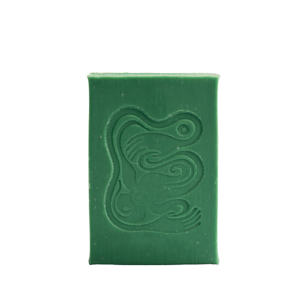 Green bar of soap with an embossed design on a white background. INBLUEM Soul Soap Finger Lime & Eucalyptus