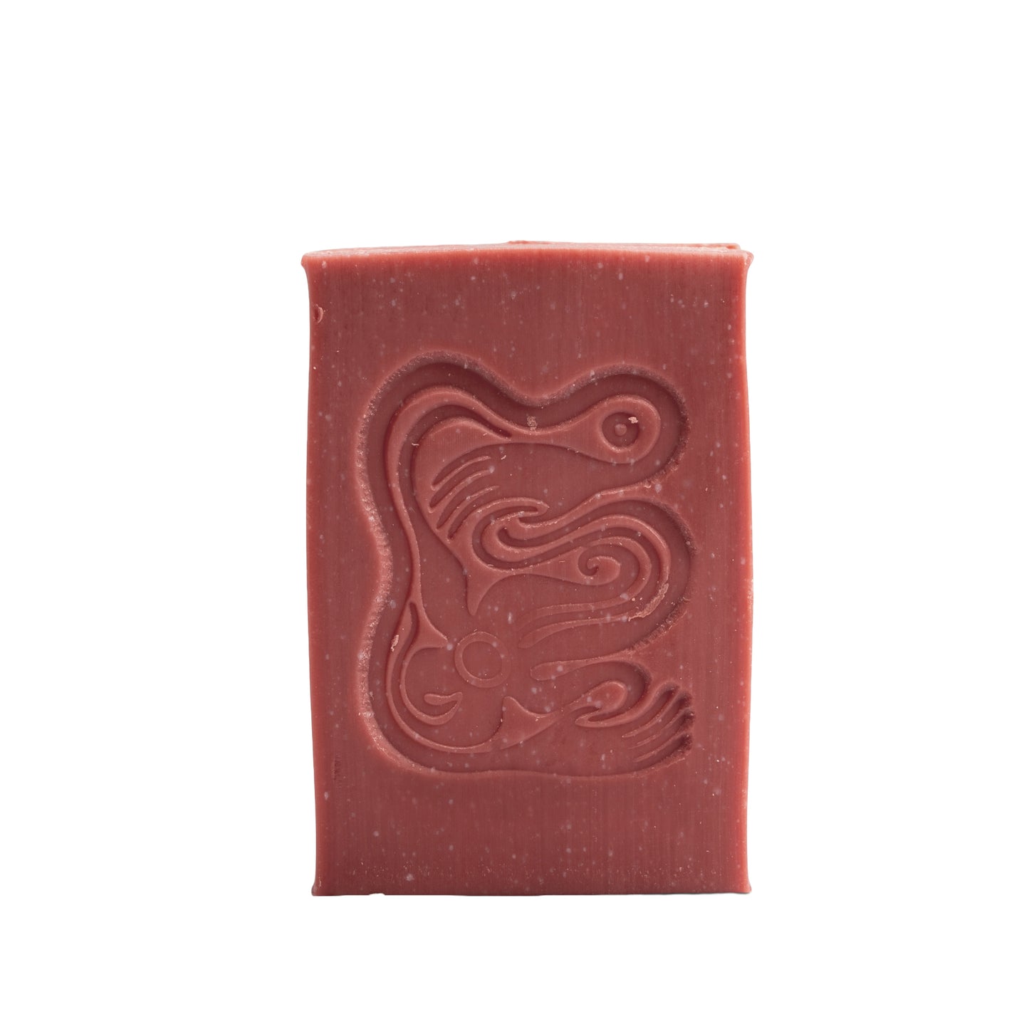 Red bar of soap with a decorative design on a white background. INBLUEM Soul Soap Kakadu Plum & Kunzea