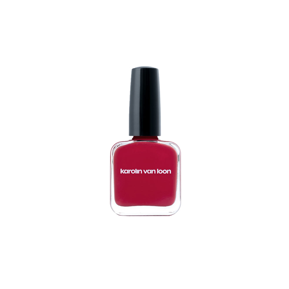 Karolin Van Loon 01 Rocher Rouge – vibrant cool red vegan nail polish in sleek glass bottle, 12-free formula made in Belgium for a classic feminine manicure.
