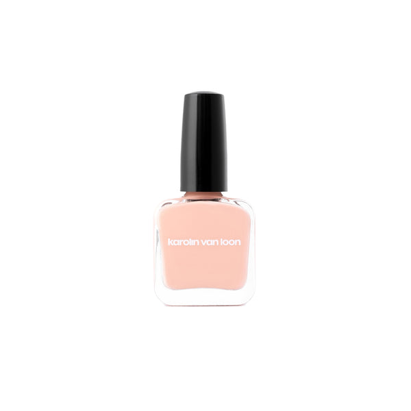 Karolin Van Loon 02 Grès Corail – vibrant coral pink nail polish with peachy undertones in a sleek glass bottle, vegan and 12-free, made in Belgium.