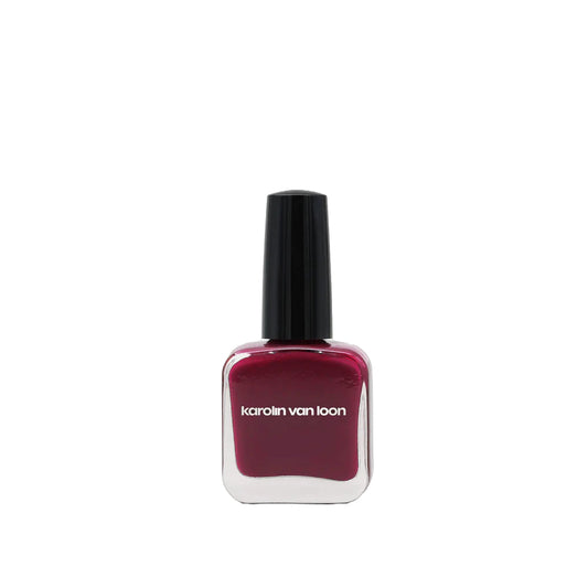 A bottle of Karolin Van Loon nail polish in shade 48 Bordeaux Velours, showcasing a rich velvety red color reminiscent of burgundy wine, perfect for pairing with crisp whites or all-black outfits.