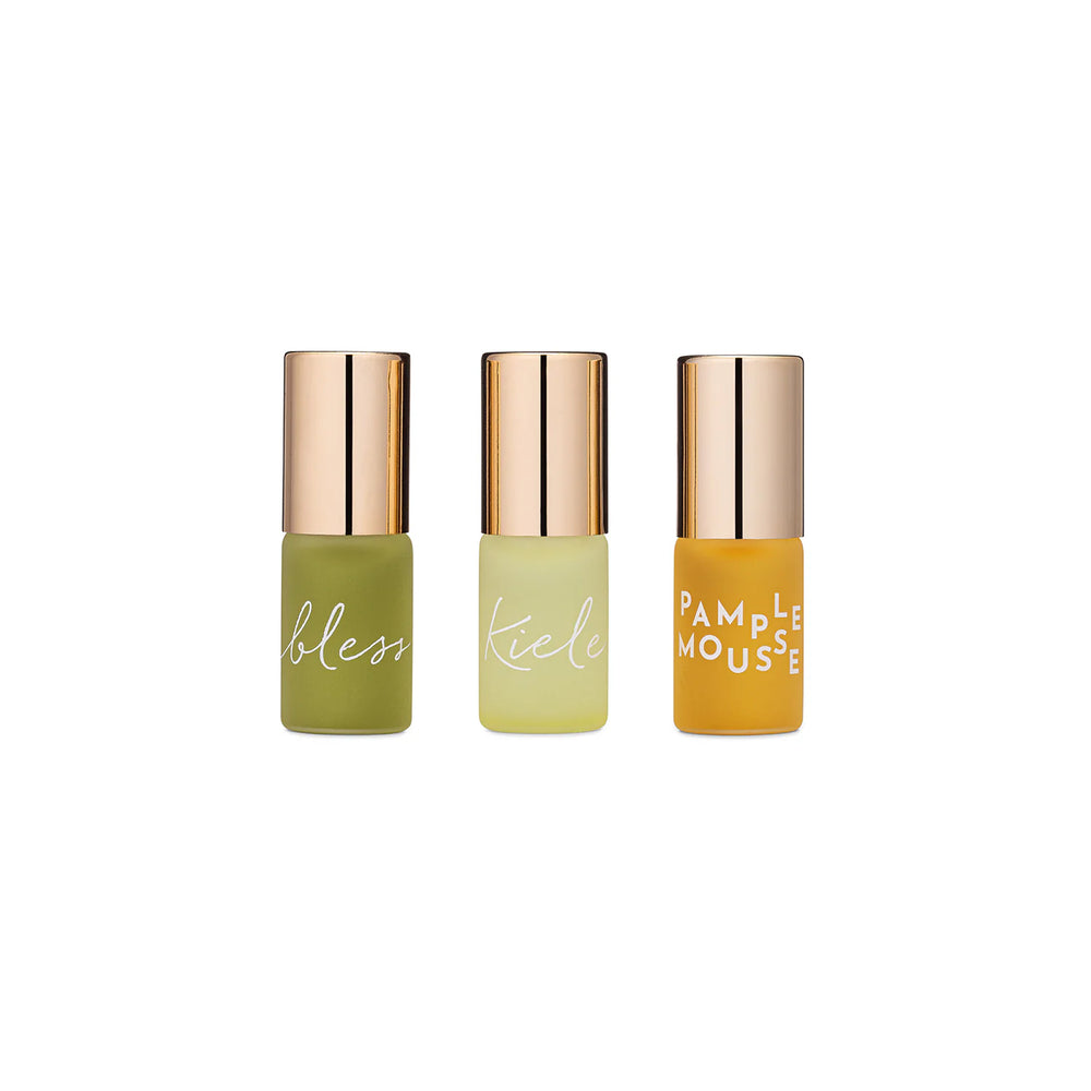 Leahlani Skincare Botanical Fragrance Discovery Set with 3 travel-size aromatherapy essences: Bless, Kiele, and Pamplemousse.
