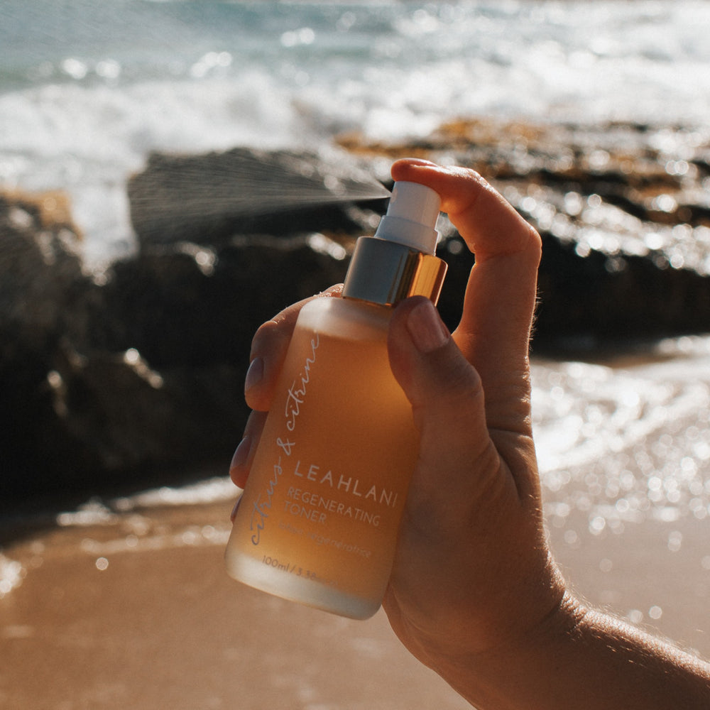 Leahlani Skincare Citrus + Citrine Toner, a refreshing facial mist with aloe, fruit acids, and citrine gemstone, designed to brighten, hydrate, and energize skin.