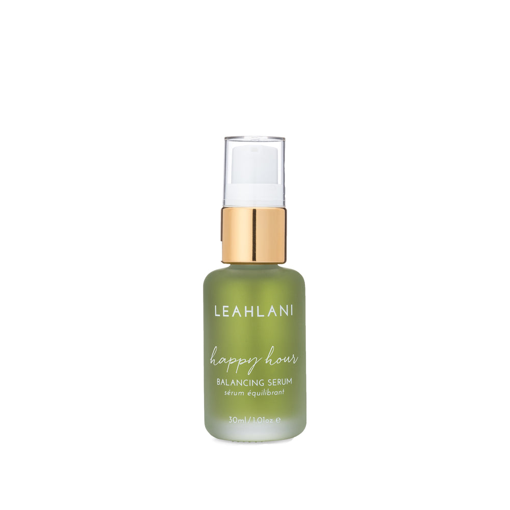 Leahlani Skincare Happy Hour Soothing Serum in a glass pump bottle, featuring calming lavender and blue tansy for sensitive, stressed-looking skin.