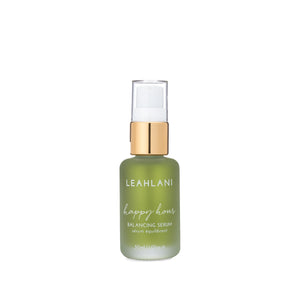 Leahlani Skincare Happy Hour Soothing Serum in a glass pump bottle, featuring calming lavender and blue tansy for sensitive, stressed-looking skin.