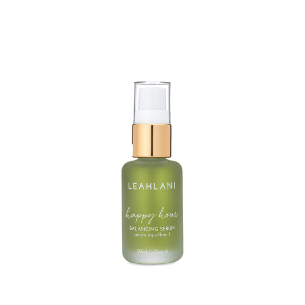 Leahlani Skincare Happy Hour Soothing Serum in a glass pump bottle, featuring calming lavender and blue tansy for sensitive, stressed-looking skin.