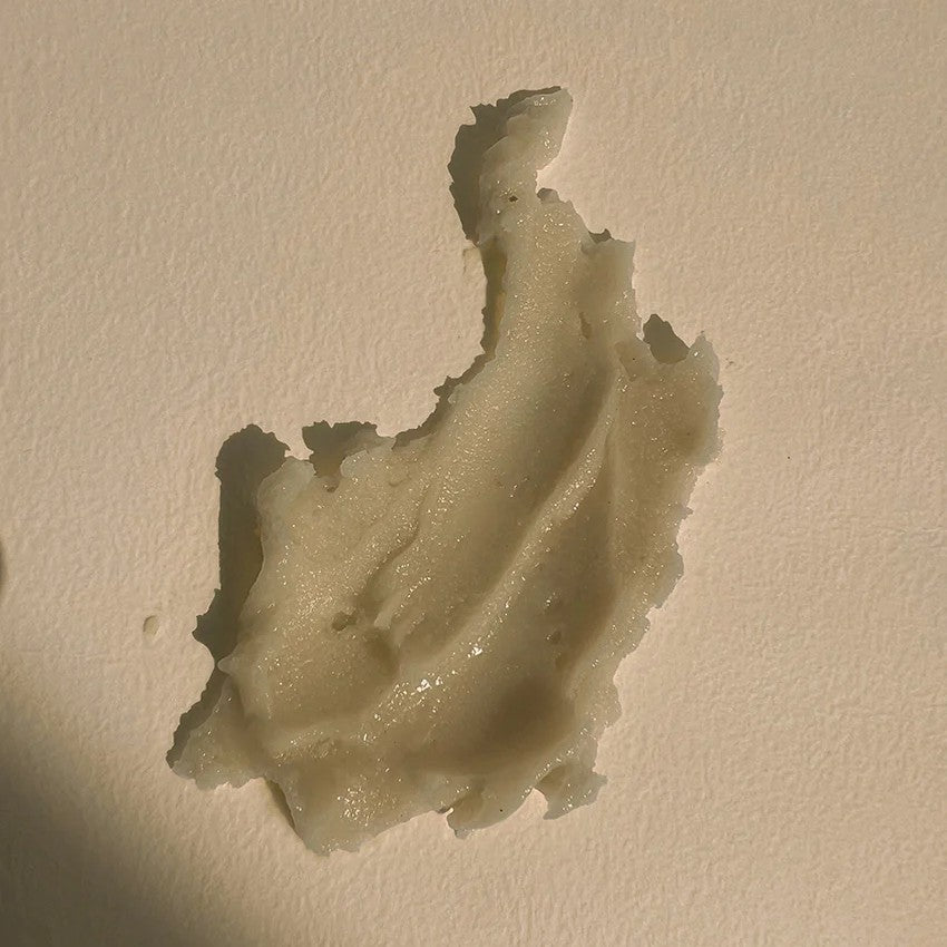 A texture swatch of the LEPAAR Night Milk Contour Balm Rejuvenating Face Refine on light beige background