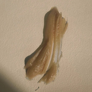 A swatch of LEPAAR Night Milk Honey Mask / Mineralising Natural Aha Face Infusion on beige background