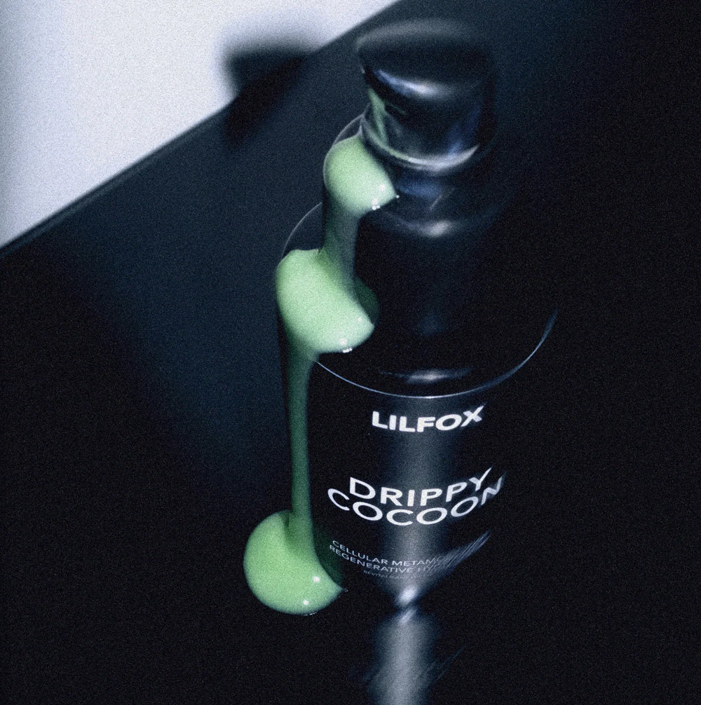 LILFOX Drippy Cocoon Regenerative HydraSerum bottle with milky texture, designed to hydrate and nourish the skin for a radiant glow.