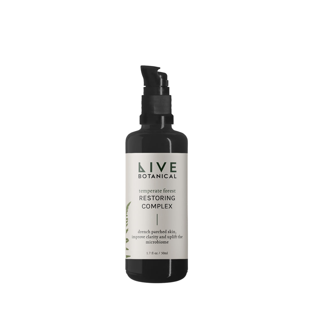 Bottle of LIVE BOTANICAL Temperate Forest Restoring Complex with natural hydration ingredients, including snow mushroom, sea kelp, and botanical extracts.