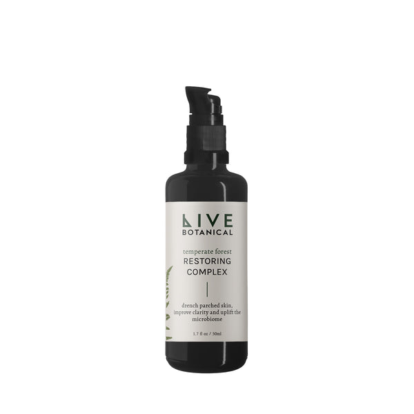 Bottle of LIVE BOTANICAL Temperate Forest Restoring Complex with natural hydration ingredients, including snow mushroom, sea kelp, and botanical extracts.