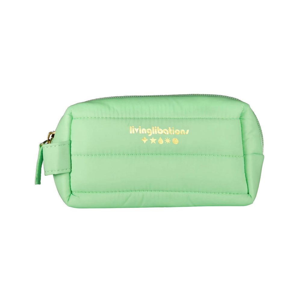 LIVING LIBATIONS Aromatherapy Apothecary Travel Kit - 28 essential oils in 5ml bottles, wrapped in a vibrant, hand-sewn travel pouch. Includes Mint + Myrrh Tooth Serum, Frankincense First Friend Mending Elixir, Illume Hotberry Fortifying Elixir, Illume Classic Camphorous Elixir, and Zest the Best Culinary Chrism. Portable, potent plant elixirs for health and resilience.