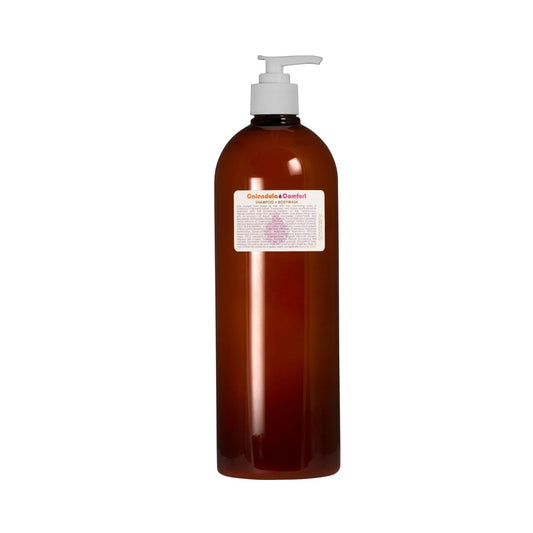 Living Libations Calendula Comfort Shampoo + Body Wash in an amber bottle, designed for gentle cleansing of skin and hair, featuring nourishing botanical ingredients like calendula and seabuckthorn.