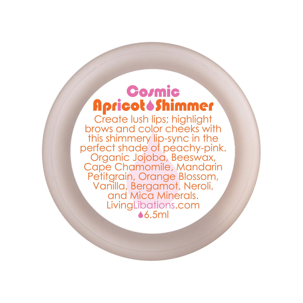 Living Libations Cosmic Apricot Shimmer balm with peachy-gold tint for lips and cheeks