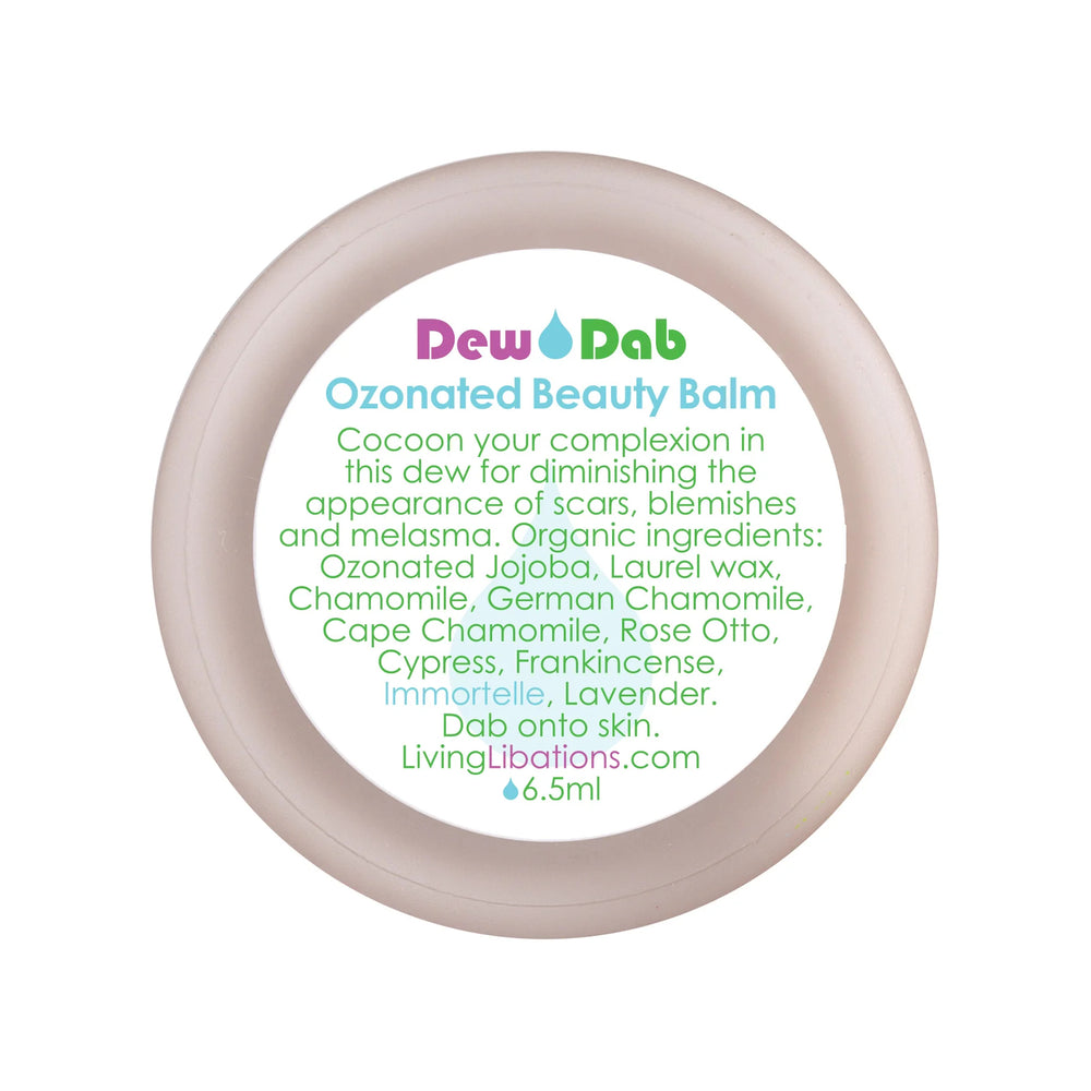 Living Libations DewDab Ozonated Beauty Balm in glass jar.
