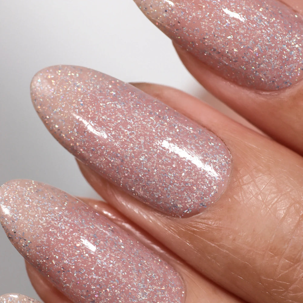 Londontown Champagne in Bed nail polish in a holographic neutral pink shade.