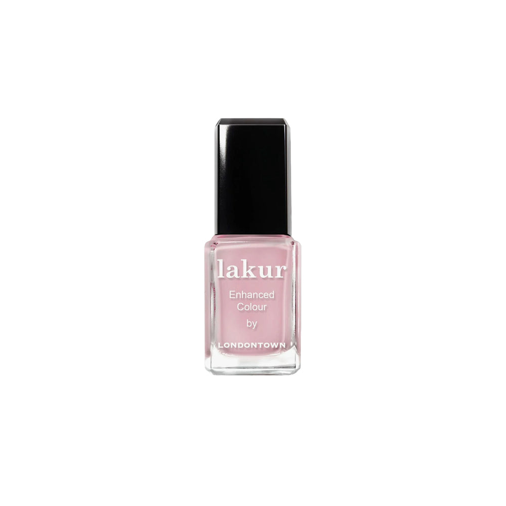 Londontown Magnolia Haze nail polish in a sheer petal pink shade.