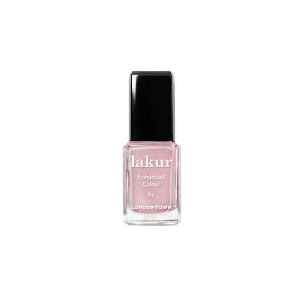 Londontown Magnolia Haze nail polish in a sheer petal pink shade.