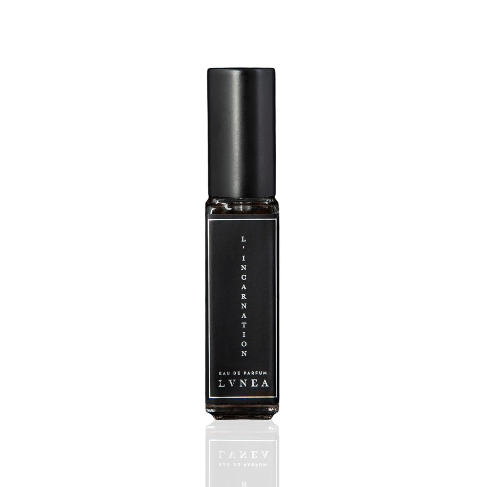 LVNEA L'Incarnation Eau De Parfum – Black glass bottle with spray top, showcasing a luxurious floral fragrance blend of carnations, musk, and honeysuckle, presented in a sleek 30 ml size. 30ml