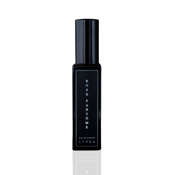 LVNEA Rose Fantôme Eau De Parfum: 30ml black glass bottle with atomizer, showcasing a sophisticated fragrance blend of rose, immortelle, and earthy notes inspired by Paris's Cimetière du Père Lachaise.