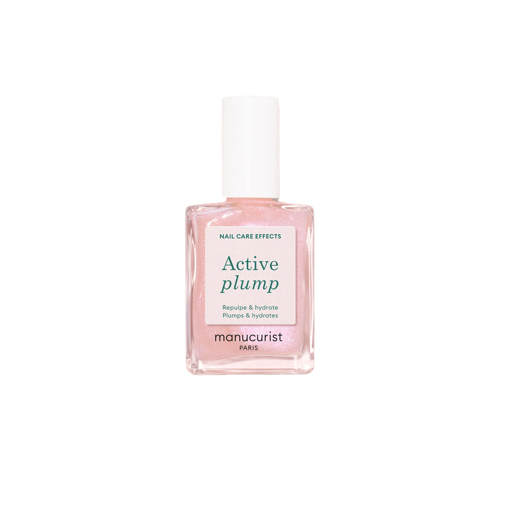 Bottle of MANUCURIST Active Plump baby pink polish with a pearly, semi-opaque finish.