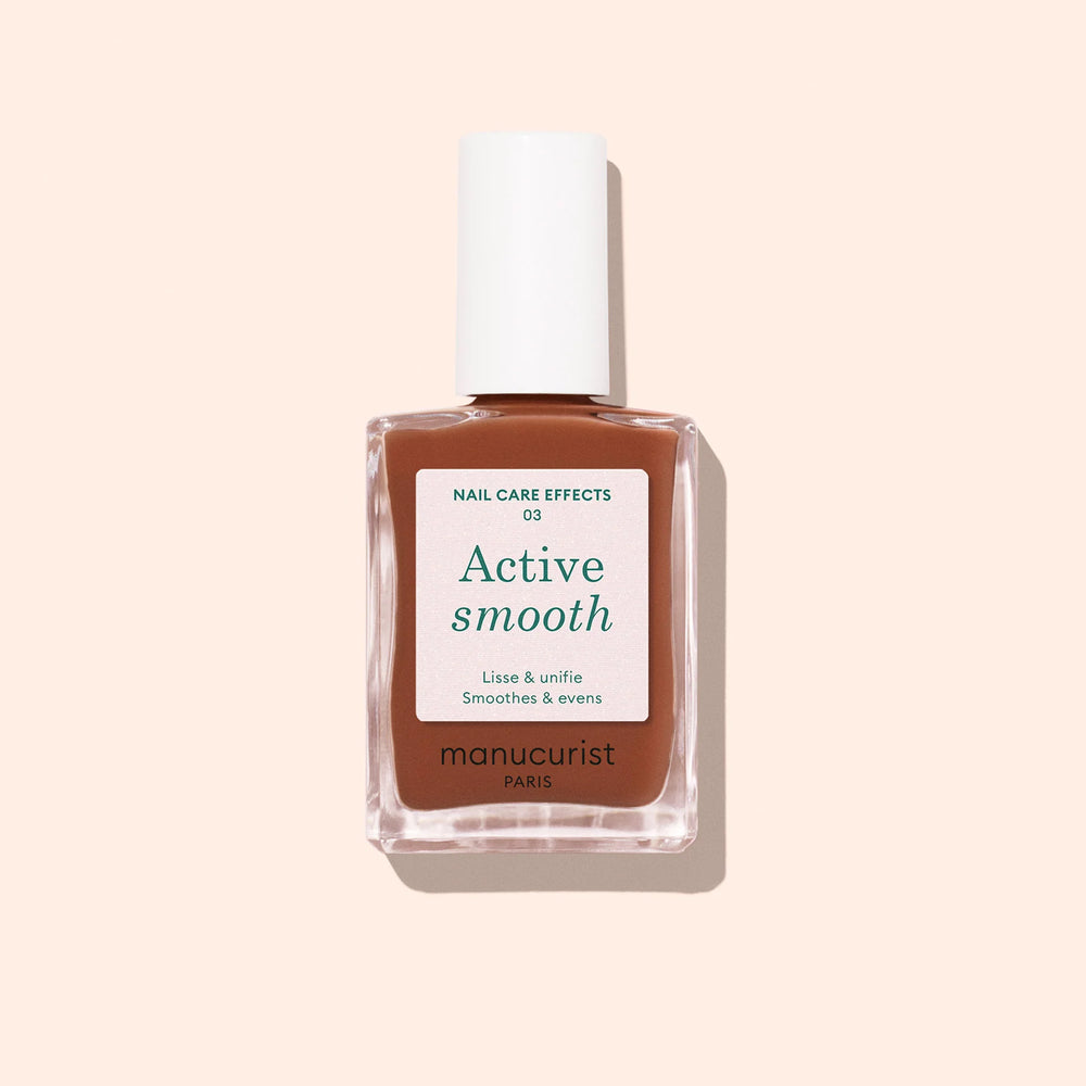 Bottle of MANUCURIST Active Smooth 03 CC Nail Polish with a rosy satin finish to perfect and smooth the nail surface.