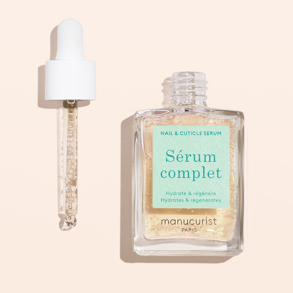 Manucurist nail and cuticle serum bottle on a white background