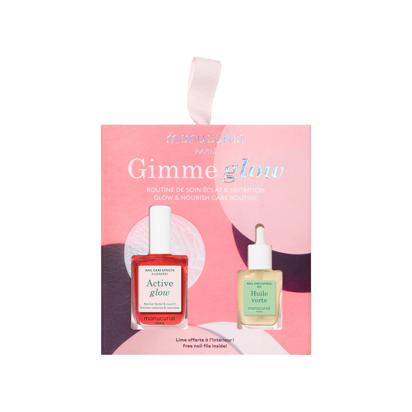 Manucurist Gimme Glow Ornament gift set with Active™ Glow Raspberry Radiance Polish, Mini Nourishing Cuticle Oil, and a free Mini Premium Nail File in a festive hanging ornament package.