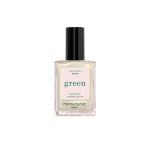 MANUCURIST Green Nail Polish Solar in a sheer white shade with golden shimmer, vegan, 12-free, and made in France.