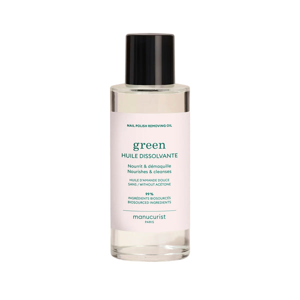 Bottle of Manucurist Green™ Nail Polish Removing Oil with orange blossom scent, enriched with sweet almond oil for gentle and nourishing nail polish removal.