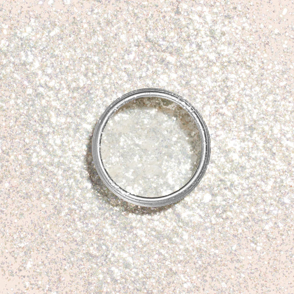 Close-up of MANUCURIST Pearlescent Flakes, a shimmering nail accessory that adds a soft, iridescent finish to any manicure.