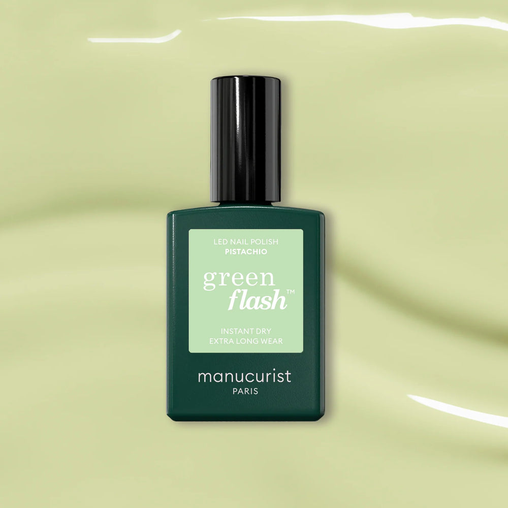 Manucurist Green Flash™ Pistachio—a pale green LED gel polish with yellow undertones in a sleek 15ml bottle.