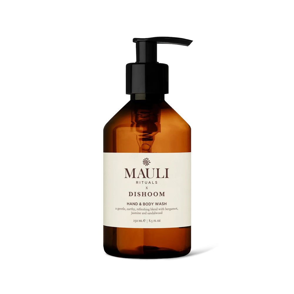 Brown bottle of Mauli Rituals x Dishoom Hand & Body Wash with black pump on white background