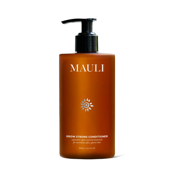 Brown shampoo bottle with black pump from Mauli Rituals on a white background
